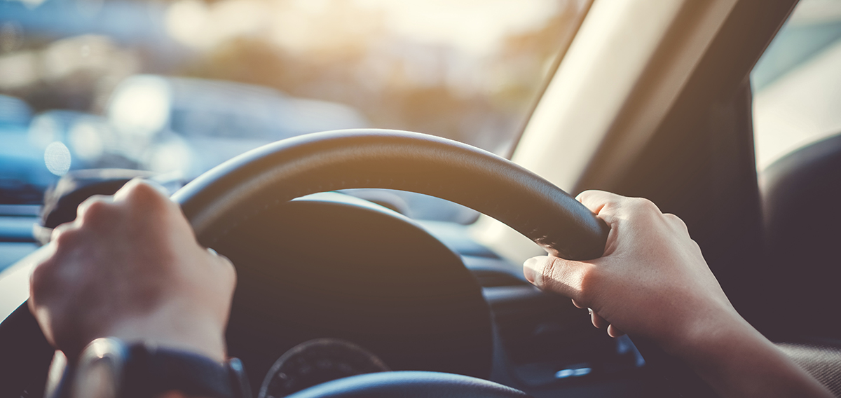 Hands on steering wheel